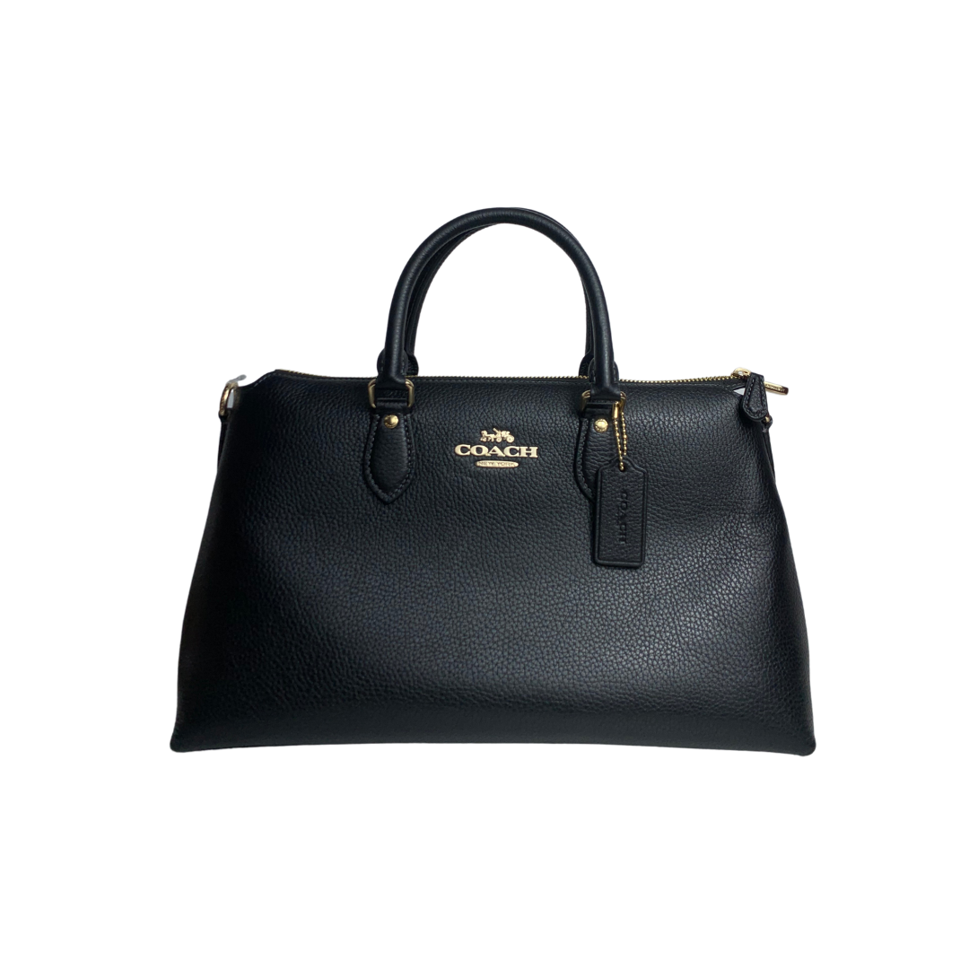 Bolso Coach negro.